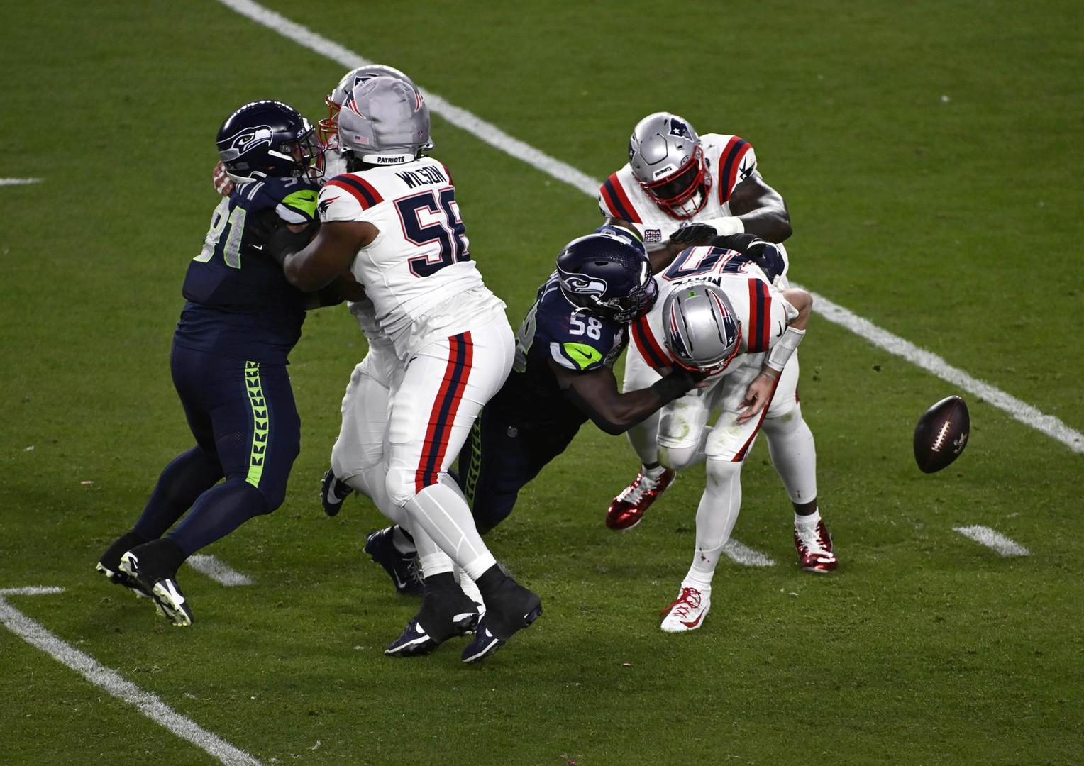 New England Patriots quarterback Drake Maye (10) fumbles the ball after being hit by Seattle Seahawks linebacker Derick Hall (58) during the NFL Super Bowl 60 LX football game between the New England Patriots and the Seattle Seahawks in Santa Clara, CA on Feb 8, 2026 Charles Baus/CSM.(Credit Image: Â Charles Baus/Cal Sport Media) Photo via Newscom Photo: Charles Baus/NEWSCOM