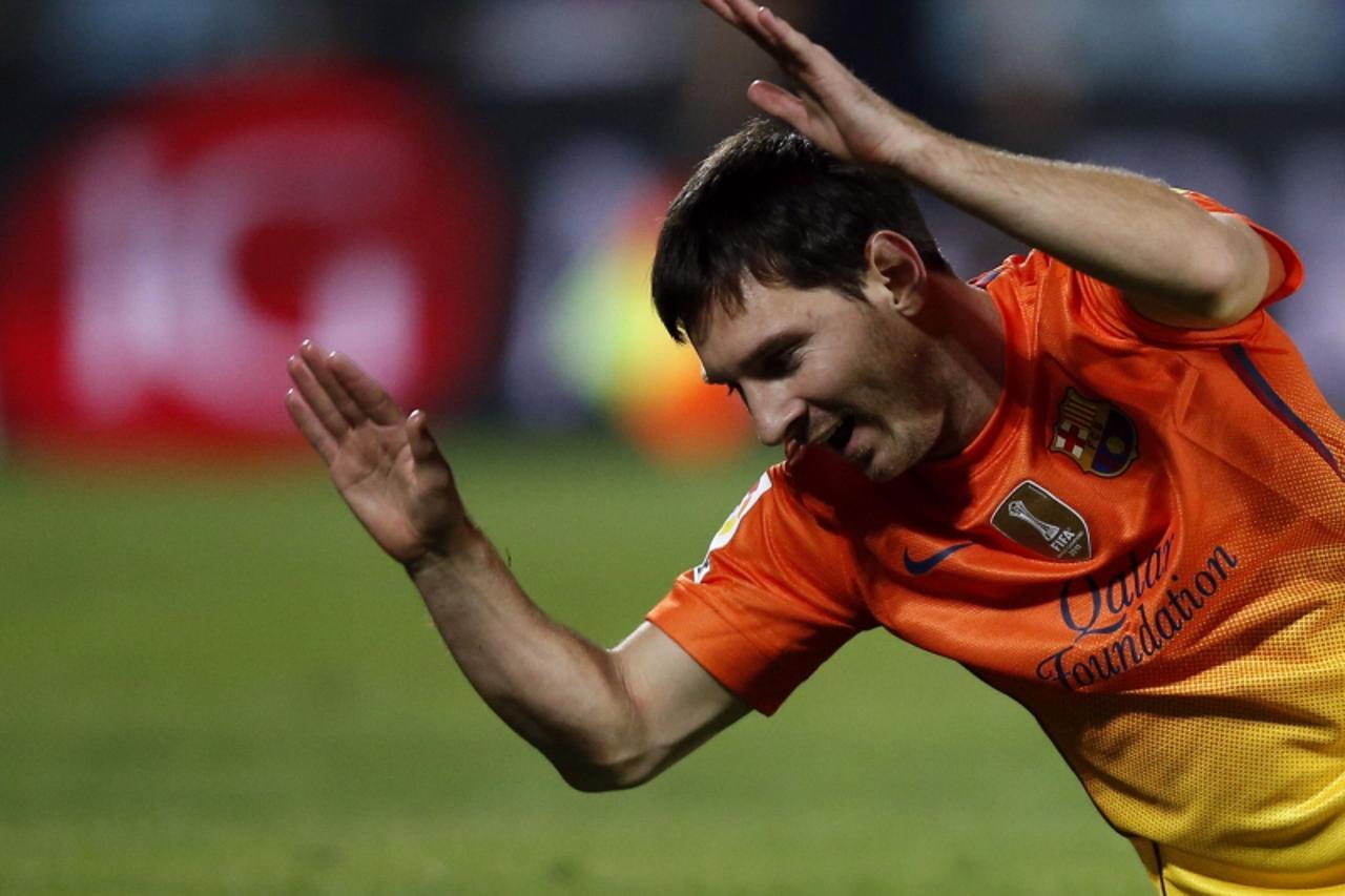 'Barcelona\'s Lionel Messi reacts after the referee did not award a penalty against Getafe during their Spanish first division soccer match at Coliseum Alfonso Perez stadium in Getafe, near Madrid, Se