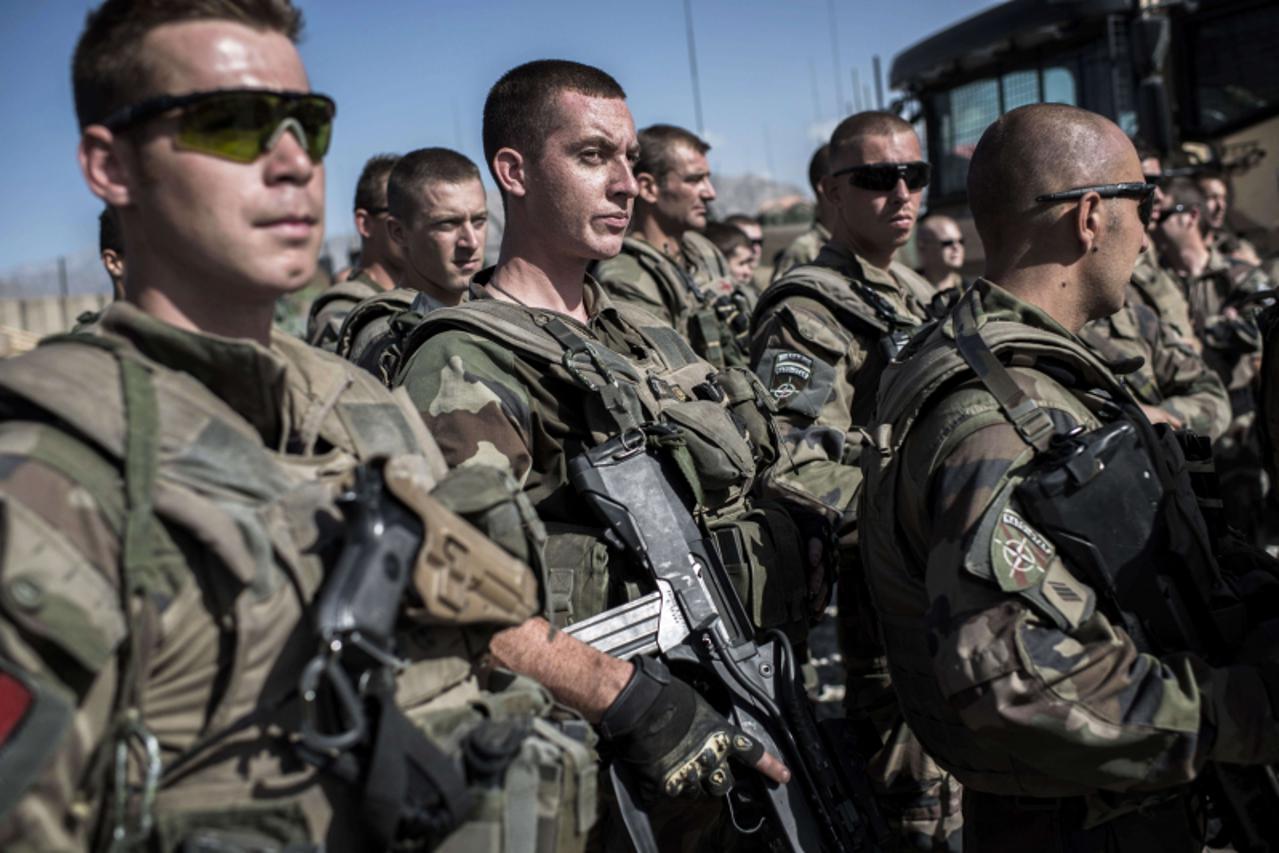 'French soldiers gather for a briefing at Nejrab base on September 21, 2012 as French troops prepare to leave Nejrab base for Warehouse base near Kabul as part of the French disengagement. France is t