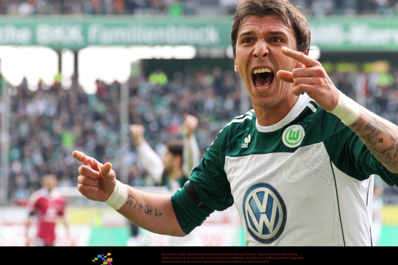 '12.03.2011, Volkswagen Arena, Wolfsburg, GER, 1.FBL,  VfL Wolfsburg vs 1. FC Nuernberg, im Bild Mario Mandzukic #18 vom VfL Wolfsburg jubelt nach seinem 1:0 Kopfballtor.   Foto Ÿ nph / Rust'