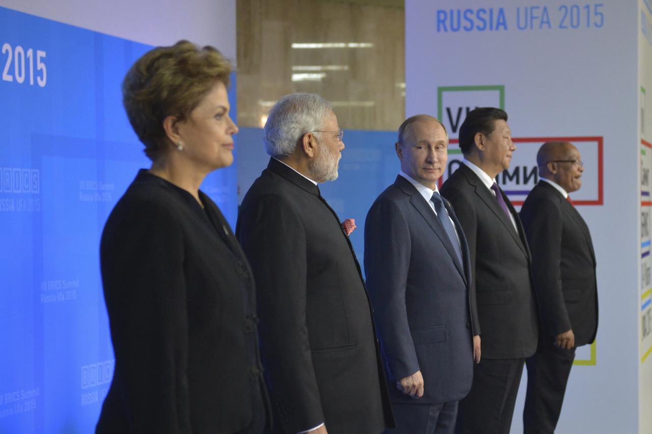(L-R) Brazil's President Dilma Rousseff, Indian Prime Minister Narendra Modi, Russian President Vladimir Putin, Chinese President Xi Jinping and South African President Jacob Zuma pose during a family photo session at the BRICS Summit in Ufa, Russia, July