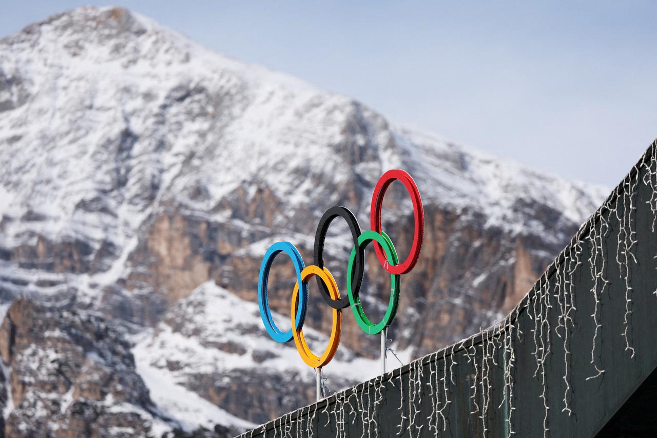 FILE PHOTO: A general view shows the Olympics rings on the Cortina Curling Olympic Stadium