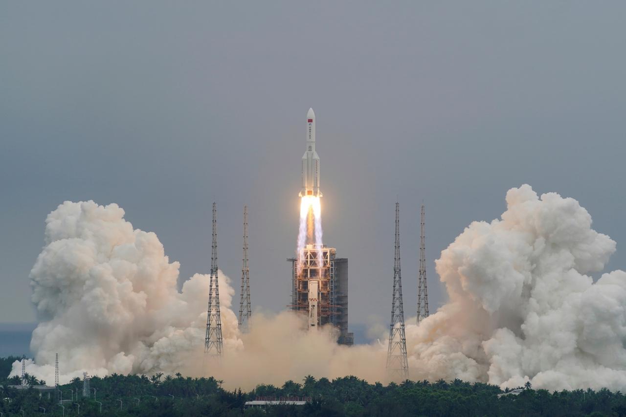 FILE PHOTO: Long March-5B Y2 rocket, carrying the core module of China's space station Tianhe, takes off from Wenchang