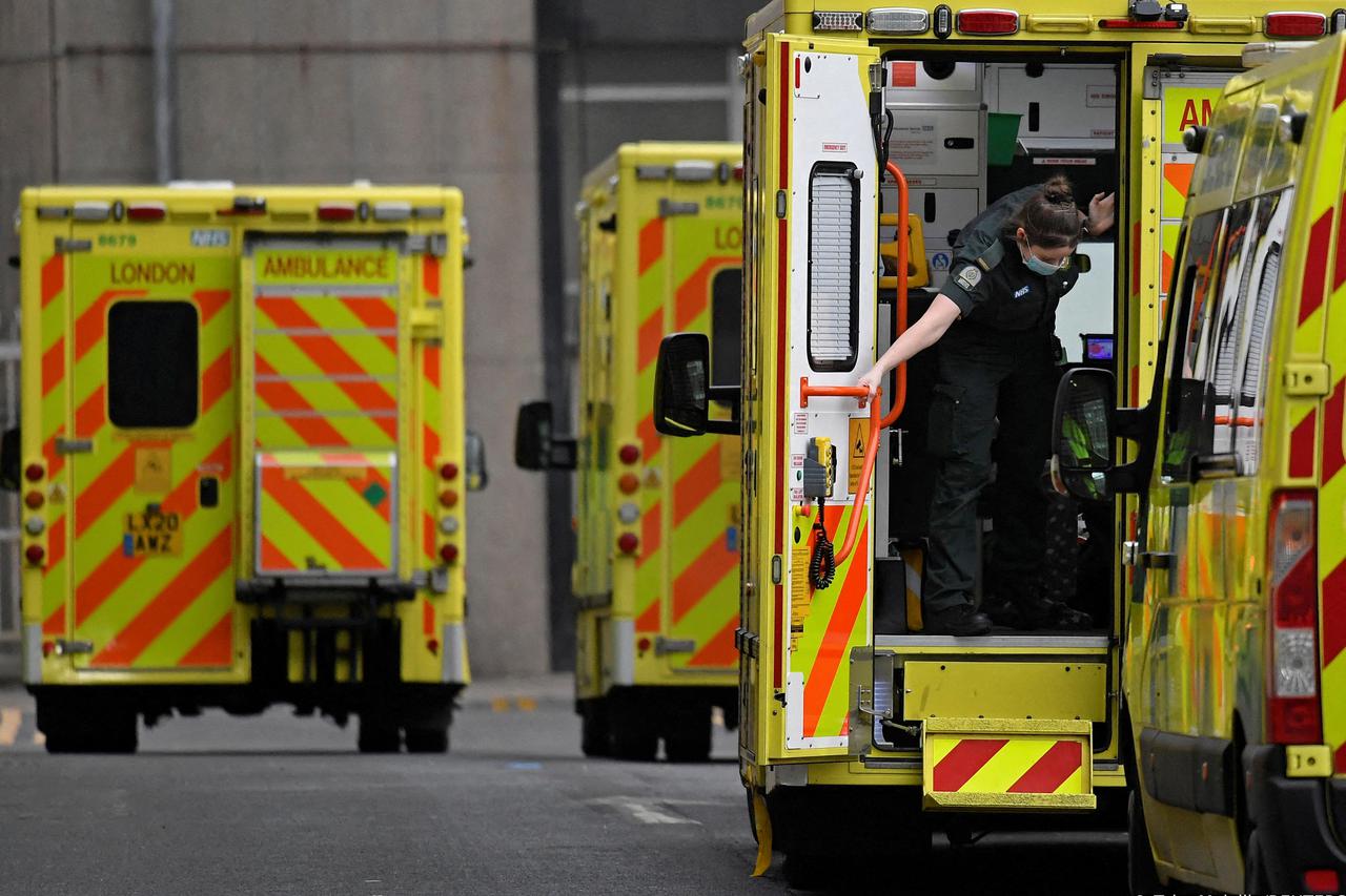 FILE PHOTO: Health workers amid the COVID-19 pandemic outside the Royal London Hospital in London