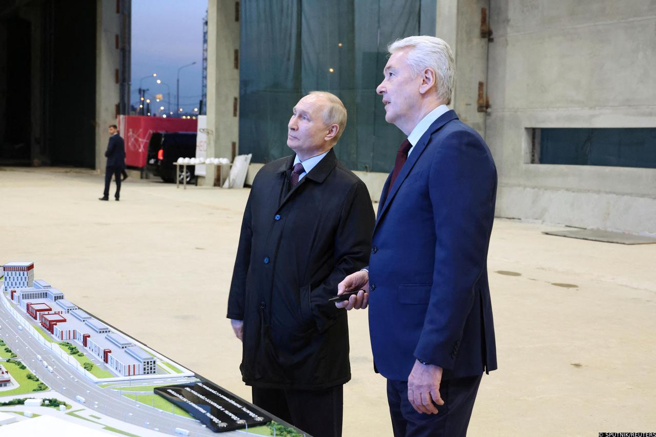 Russian President Vladimir Putin visits the Rudnyovo industrial park in Moscow