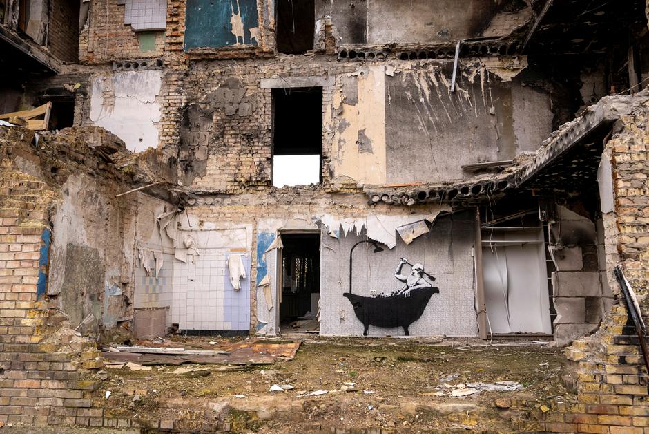 A new graffiti in Banksy's signature style is seen in the Ukraine