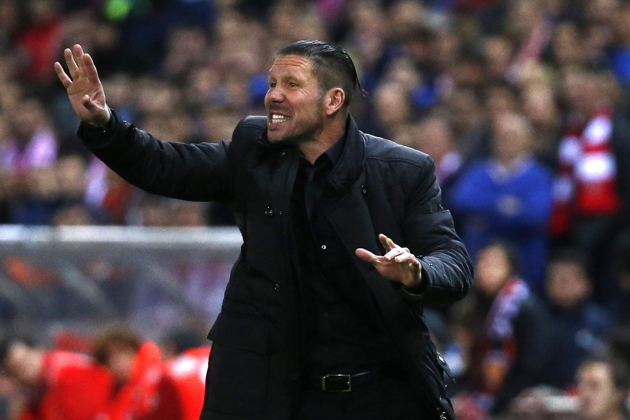 Atletico Madrid's coach Diego Simeone gestures during their Spanish first division soccer match against Valencia at Vicente Calderon stadium in Madrid March 8, 2015. REUTERS/Juan Medina (SPAIN - Tags: SPORT SOCCER)  Picture Supplied by Action Images