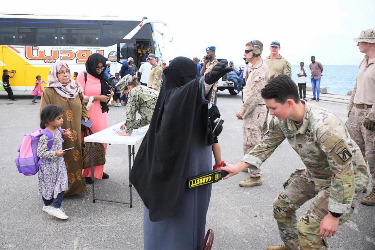 American nationals arrive for evacuation from the port in Port Sudan
