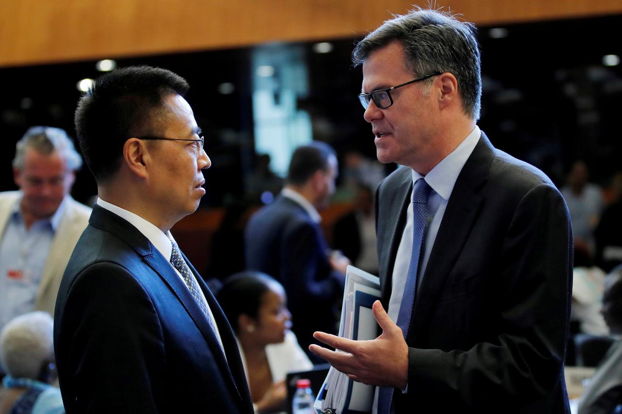 Zhang Xiangchen i Dennis Shea