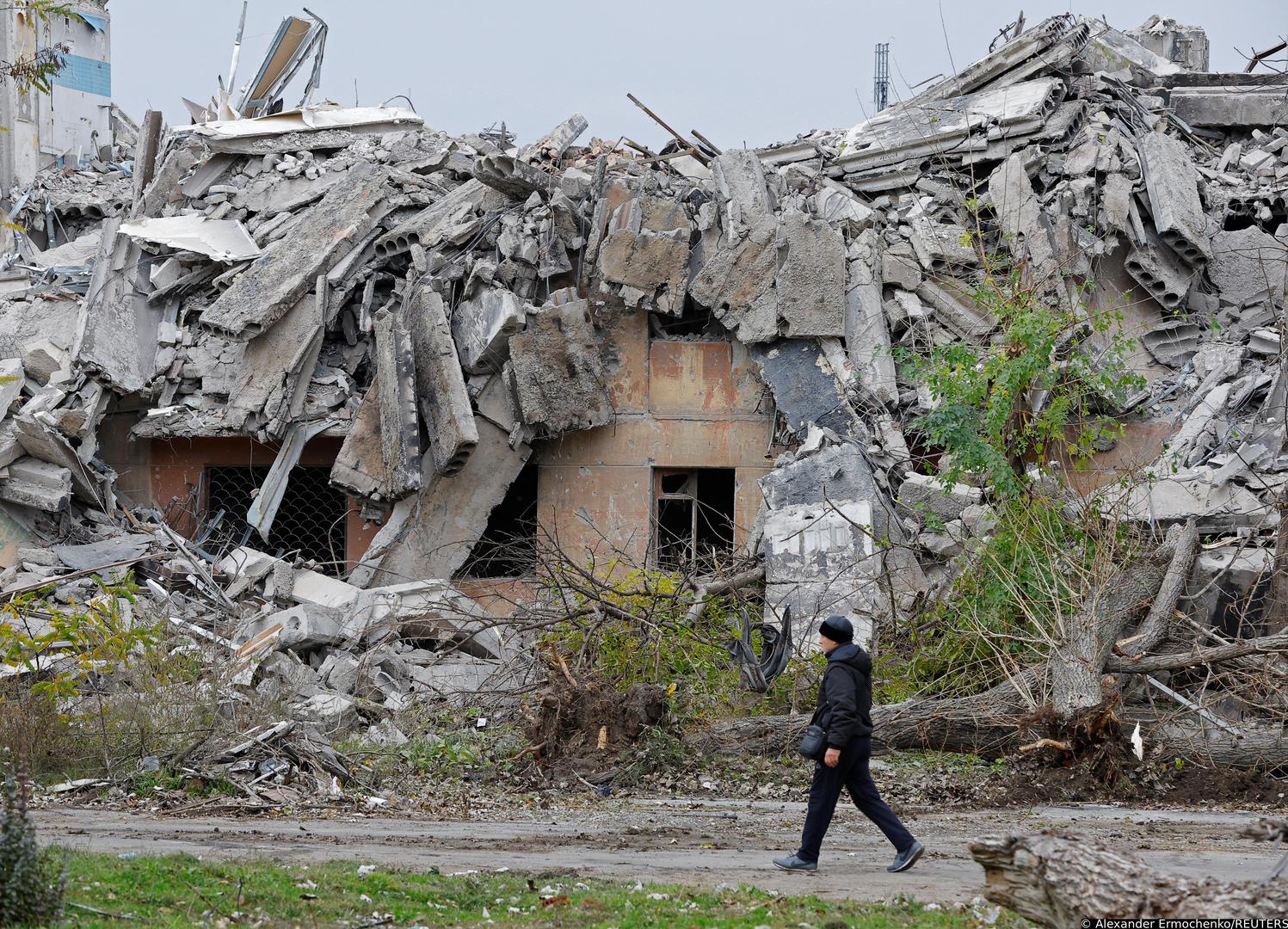A man walks past the ruins of a building destroyed in the course of Russia-Ukraine conflict in Mariupol, Russian-controlled Ukraine, November 9, 2022. REUTERS/Alexander Ermochenko Photo: Alexander Ermochenko/REUTERS