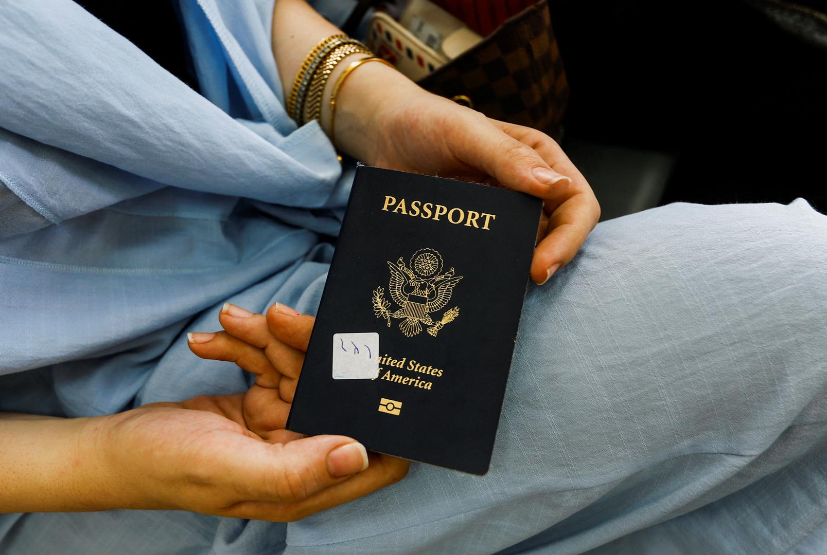 Suzan Besaiso, a Palestinian holding a U.S. passport, shows her passport as she waits for permission to leave Gaza, amid the ongoing conflict between Israel and Palestinian Islamist group Hamas, at the Rafah border crossing with Egypt, in Rafah in the southern Gaza Strip, November 2, 2023. REUTERS/Ibraheem Abu Mustafa Photo: IBRAHEEM ABU MUSTAFA/REUTERS