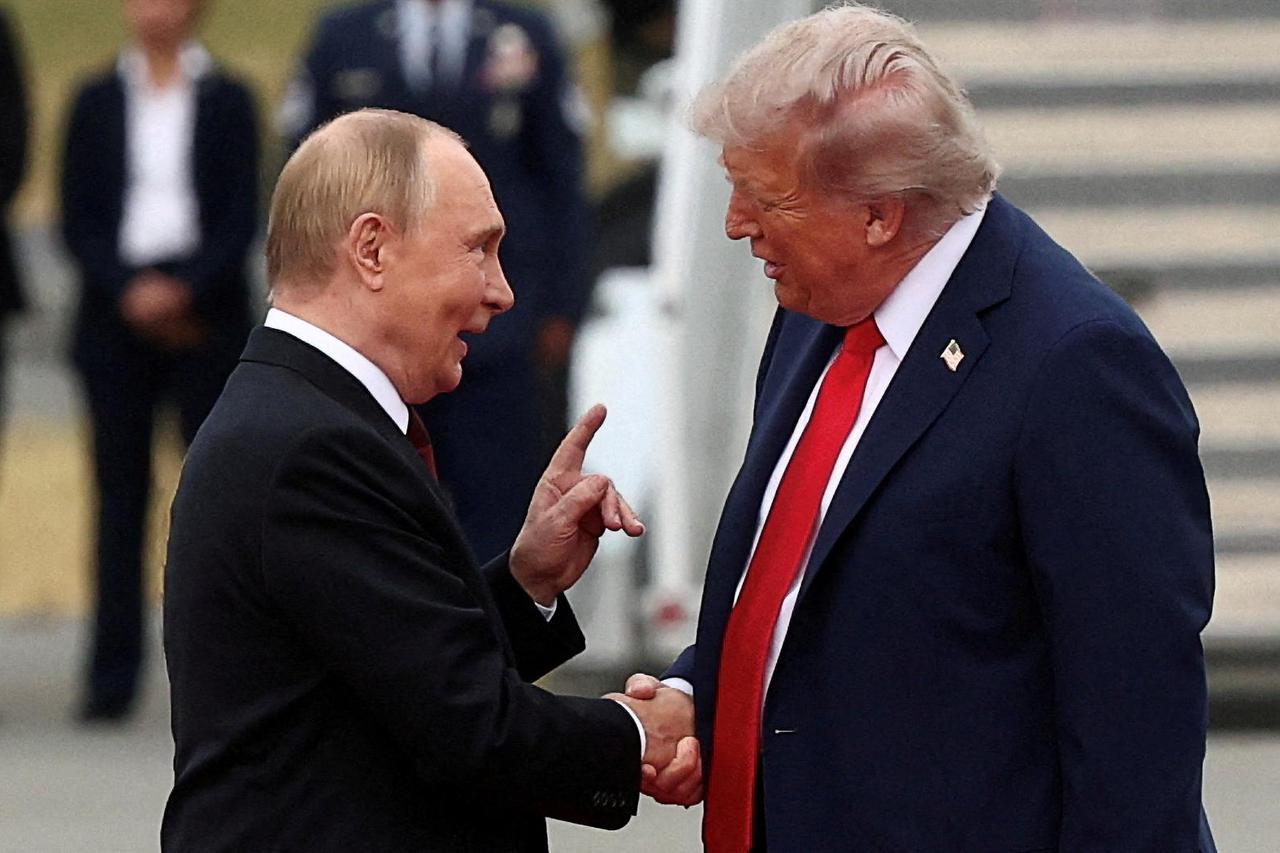 FILE PHOTO: U.S. President Trump meets with Russian President Putin in Alaska