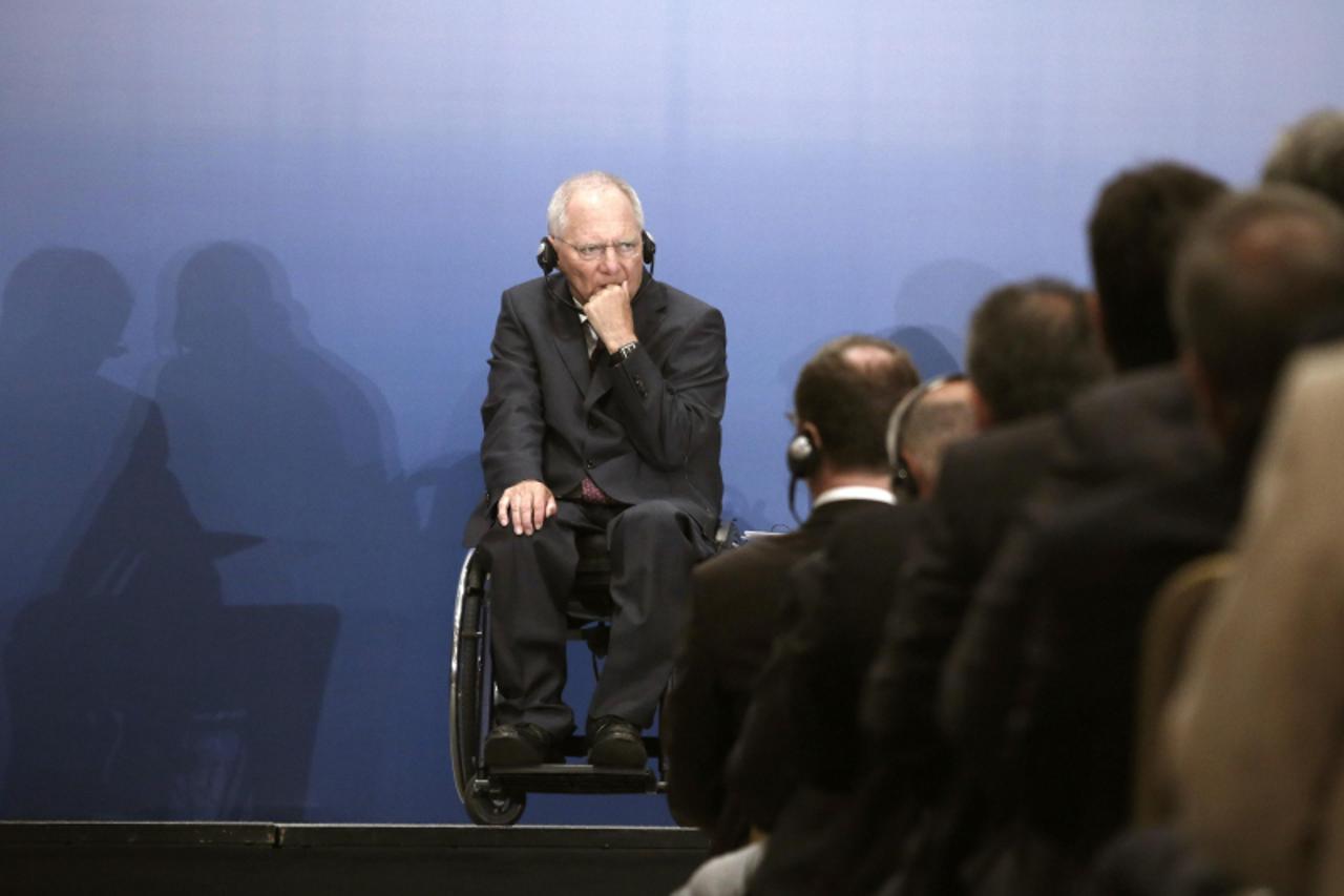 'German Finance Minister Wolfgang Schaeuble takes part in a Greek-German industry and trade chamber meeting in Athens July 18, 2013. Greek police have banned protests and traffic in downtown Athens on
