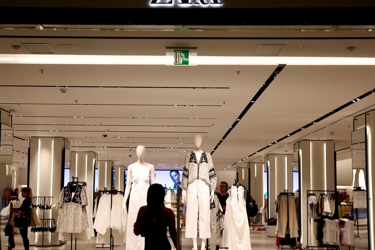 A person enters the Zara store, during Christmas season at the RIOSUL Shopping Center in Rio de Janeiro