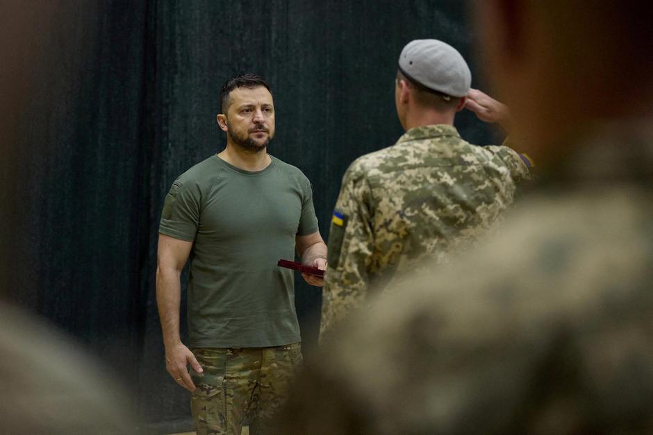 Ukraine's President Zelenskiy awards a serviceman in Odesa