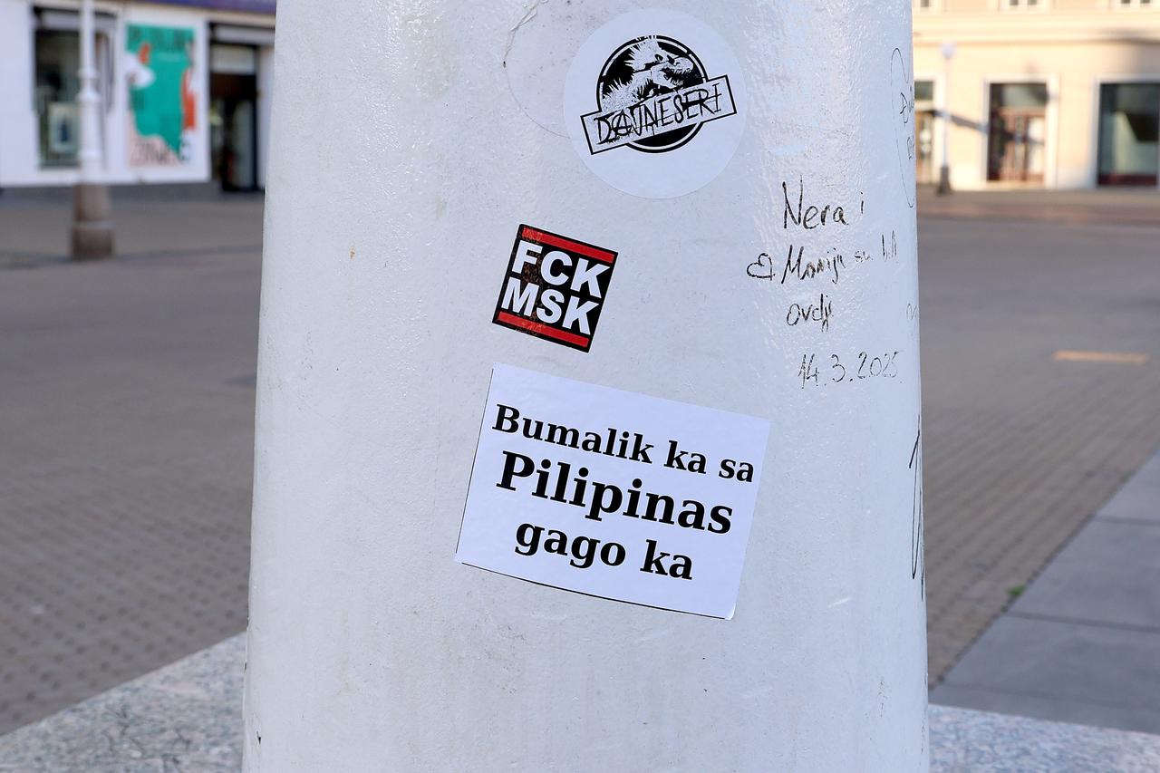 Zagreb: Na Trgu bana Jelačića pojavile su se naljepnice koje prevode na "Vrati se na Filipine idiote"