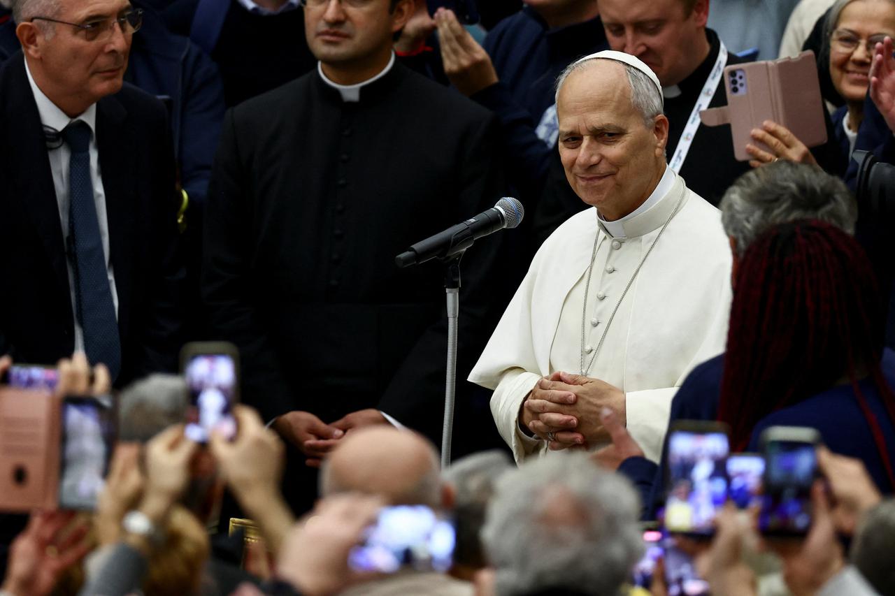 Pope Leo XIV attends a lunch with poor people in Paul VI Hall at the Vatican