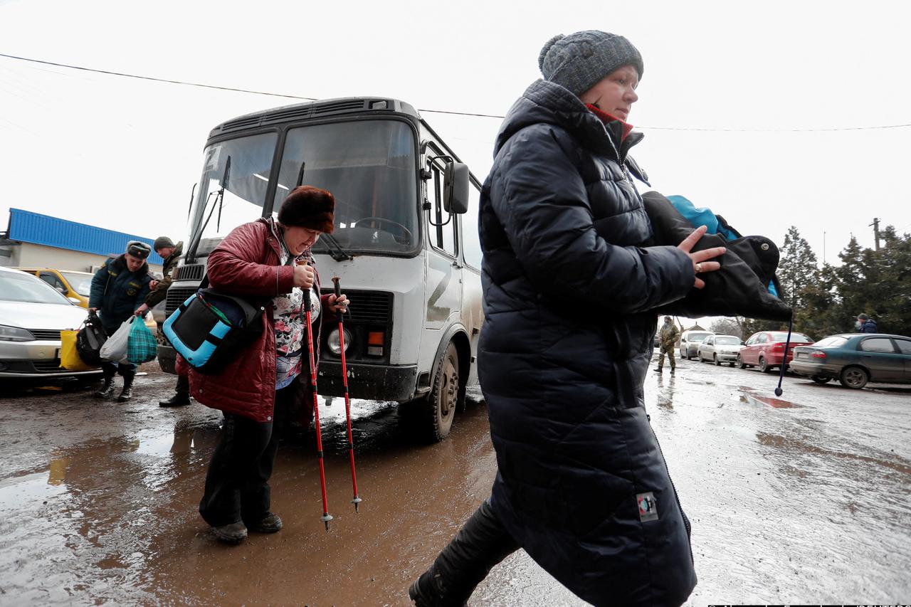 Evacuees from Mariupol area arrive at a camp in Bezymennoye