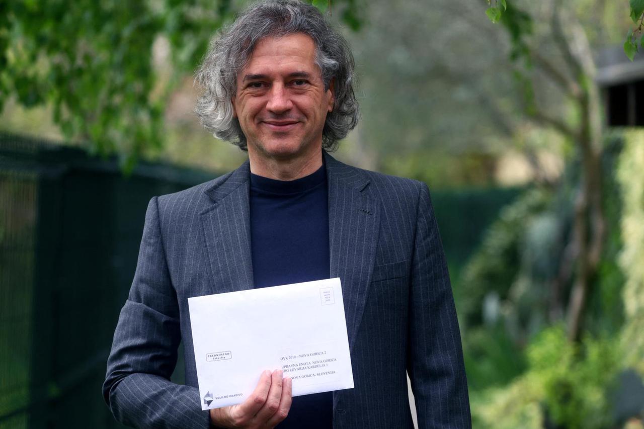Slovenian parliamentary candidate Robert Golob casts his vote through post during the general elections, in Nova Gorica