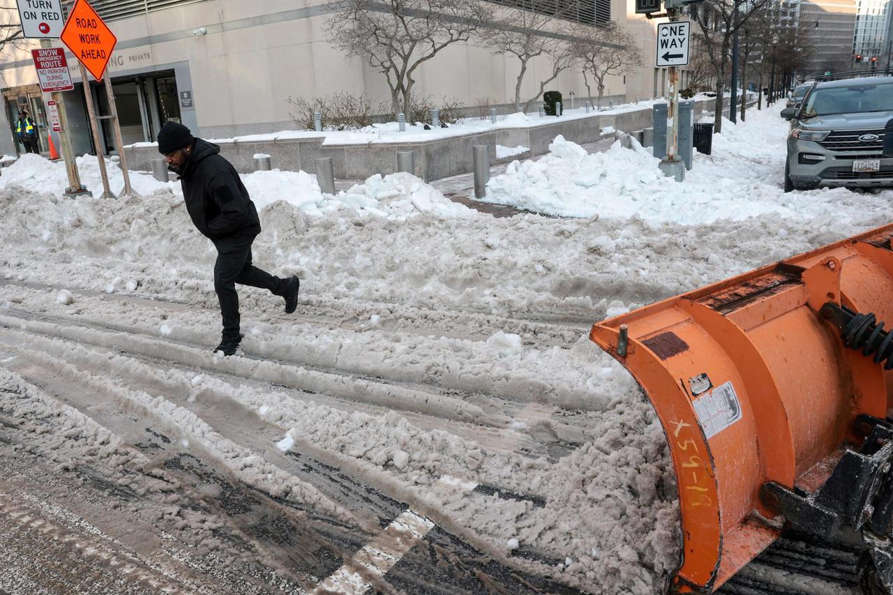 People deal with the aftermath of a major winter storm across a large swath of the United States