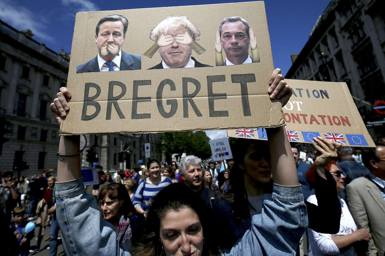 People hold banners during a 'March for Europe' demonstration against Britain's decision to leave the European Union, in central London, Britain July 2, 2016. Britain voted to leave the European Union in the EU Brexit referendum.     REUTERS/Neil Hall  