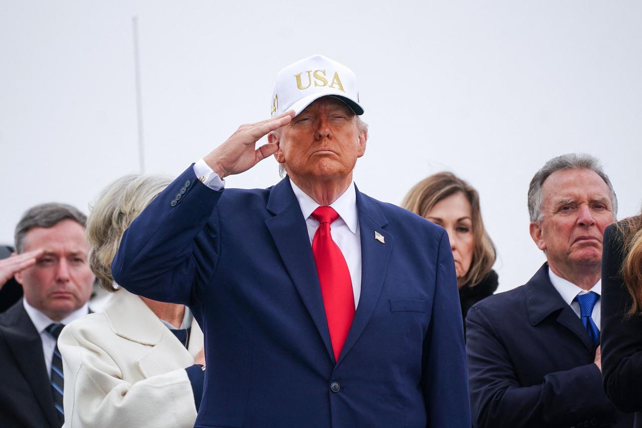 Dignified transfer of the remains of six U.S. Army 103rd Sustainment Command service members killed in Kuwait, in Dover, Delaware