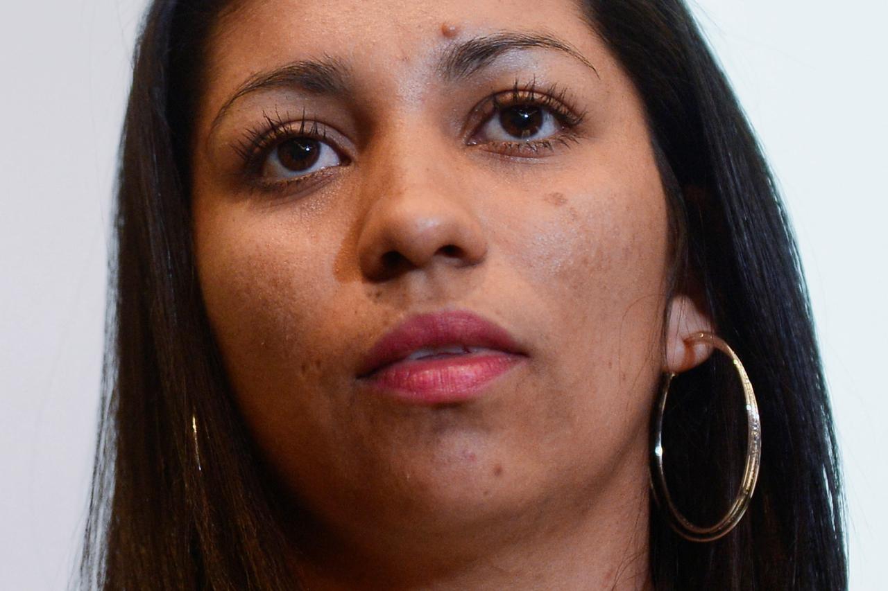 Lilian, a woman sentenced to 30 years in prision holds a press conference after her release, in San Salvador