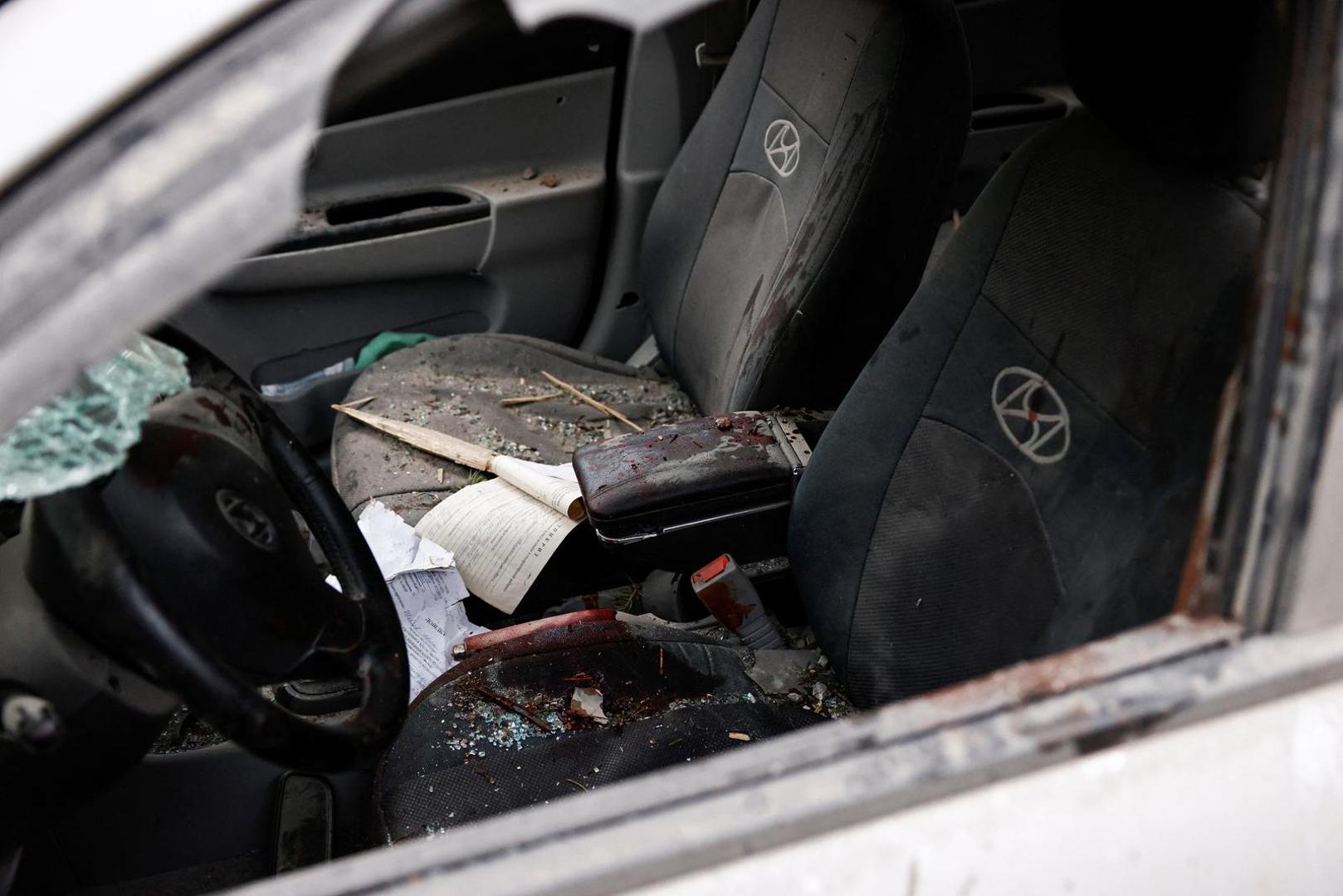 The interior of a vehicle with blood stains is seen in the aftermath of deadly shelling of an army office building, amid Russia's attack, in Sloviansk, Ukraine, March 27, 2023. REUTERS/Violeta Santos Moura Photo: VIOLETA SANTOS MOURA/REUTERS