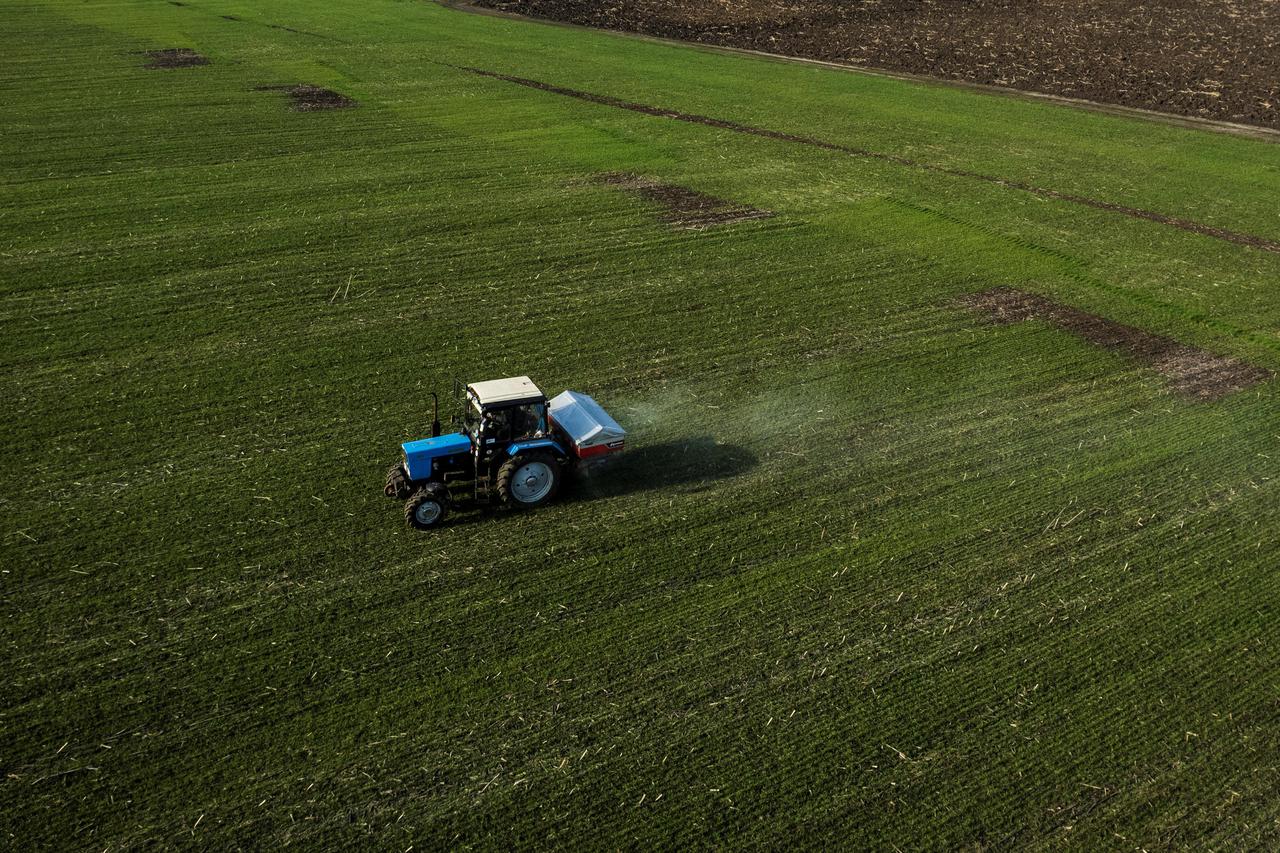 The Wider Image: Inside a Ukrainian village where farmers stay for the wheat harvest but fear Russian attack