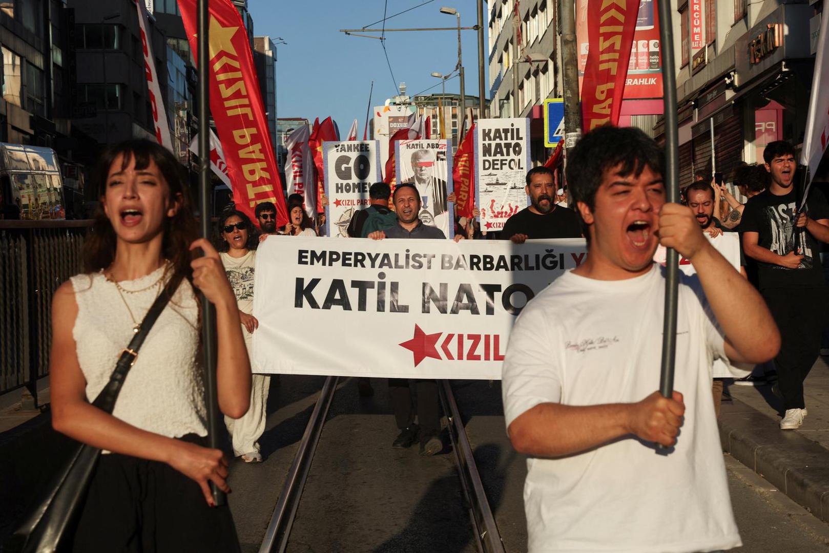 Demonstrators hold signs and flags during a protest ahead of NATO leaders' summit, in Istanbul, Turkey, July 5, 2026. REUTERS/Dilara Senkaya Photo: DILARA SENKAYA/REUTERS