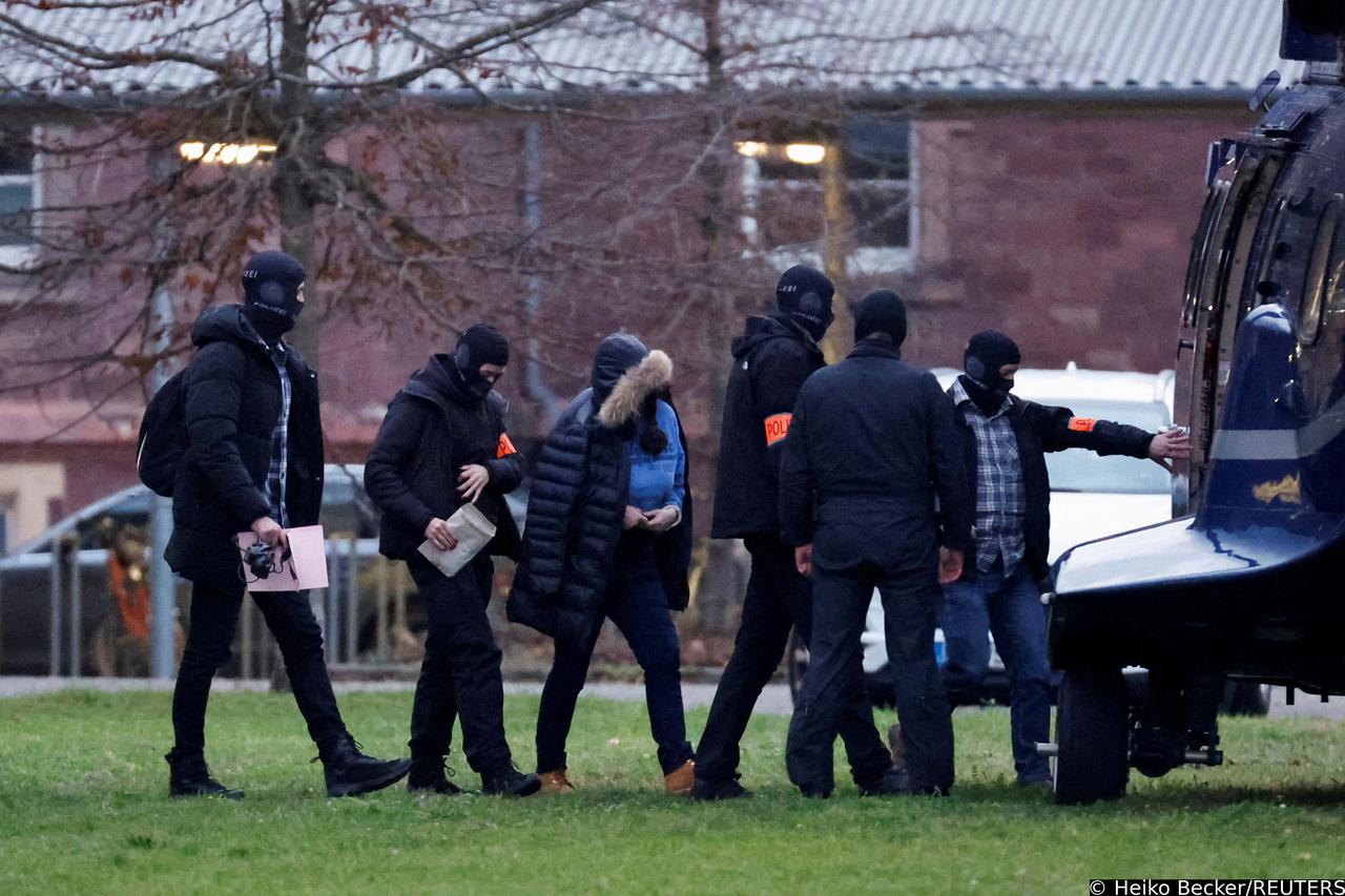FILE PHOTO: Police escorts a person in Karlsruhe
