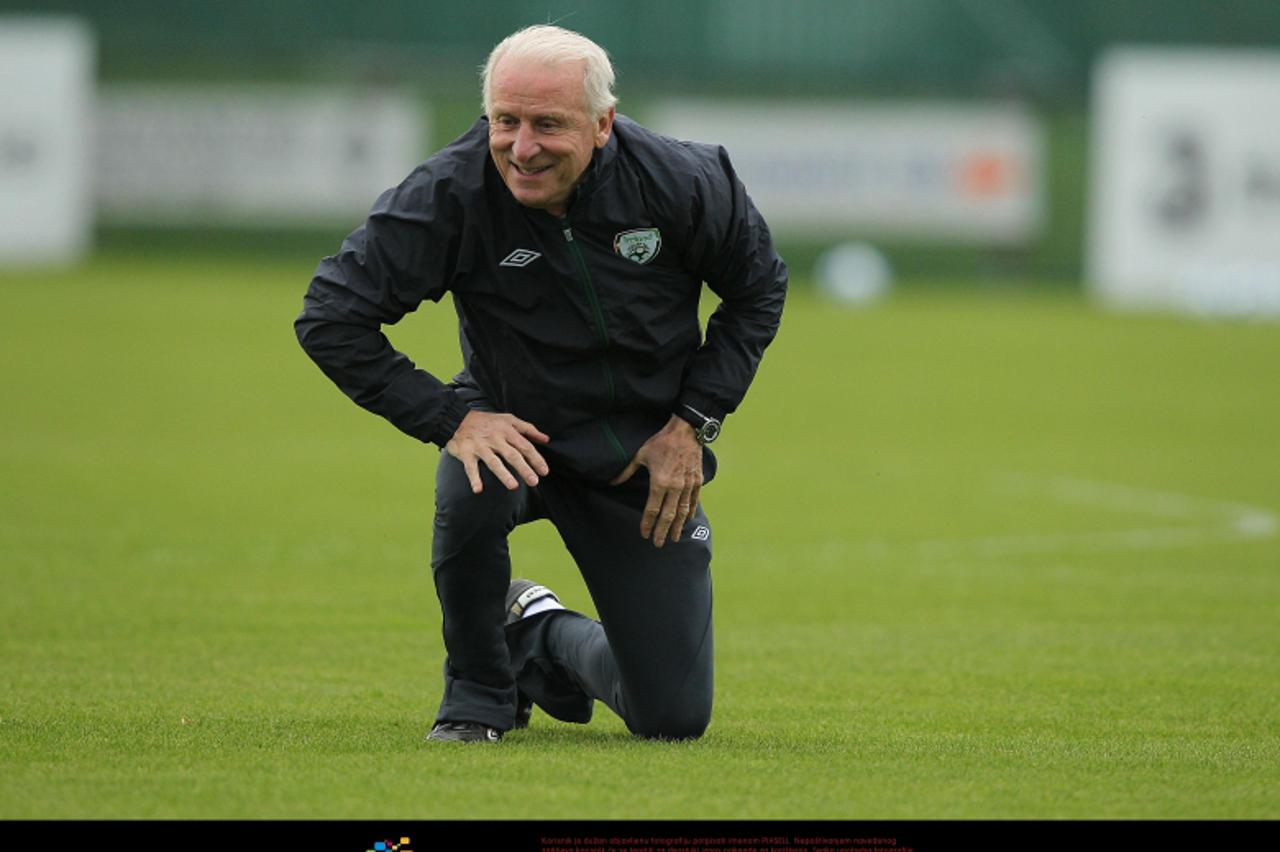 \'Republic of Ireland manager Giovanni Trapattoni takes a tumble during a training session at Gannon Park Malahide, Dublin. Photo: Press Association/Pixsell\'