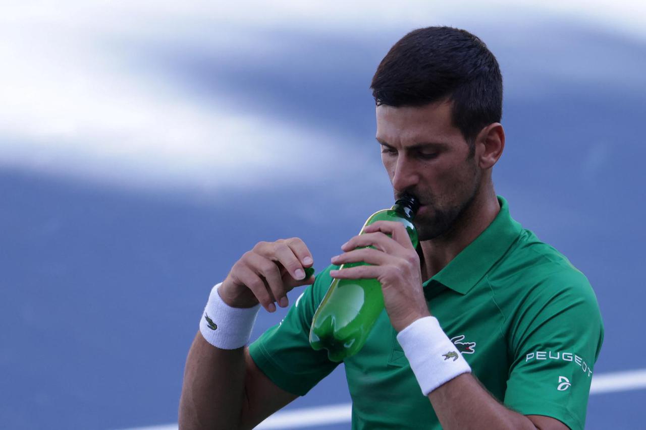 Serbian tennis player Novak Djokovic performs during the opening of a regional tennis centre that will prepare top tennis players for major tournaments, in Visoko