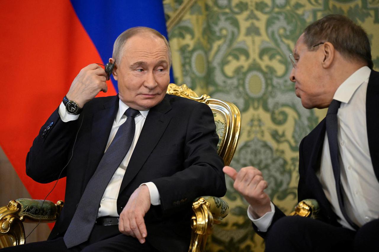 Russian President Vladimir Putin meets with Malaysian Prime Minister Anwar Ibrahim in Moscow