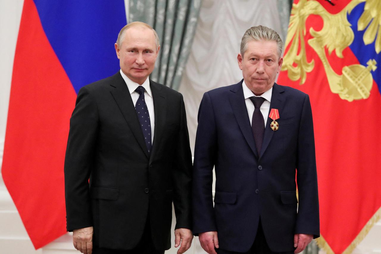 Russian President Putin and Lukoil First Executive Vice President Maganov attend an award ceremony in Moscow