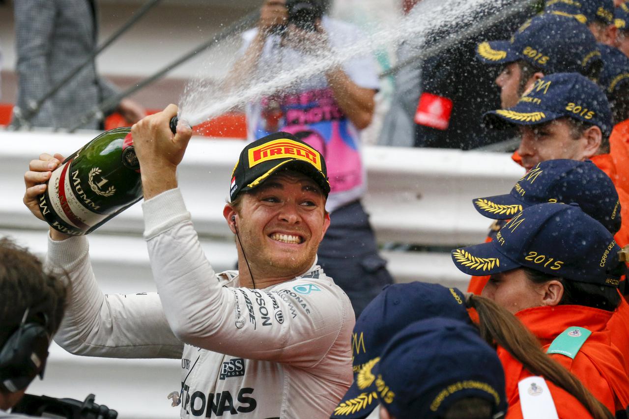 Mercedes Formula One driver Nico Rosberg of Germany sprays champagne after winning the Monaco F1 Grand Prix in Monaco May 24, 2015. REUTERS/Robert Pratta