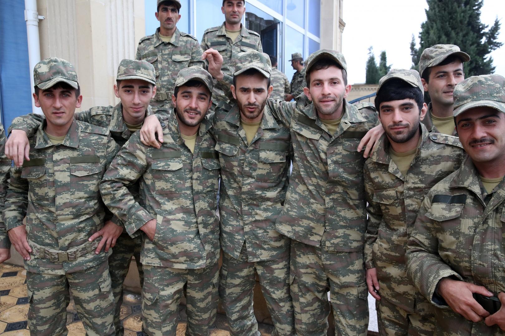 BARDA, AZERBAIJAN - OCTOBER 5, 2020: Azerbaijani servicemen pose for a photograph ahead of being deployed to the front line. The situation in Nagorno-Karabakh escalated on September 27, 2020, with reports from Yerevan on the Azerbaijani troops advancing in the direction of Nagorno-Karabakh and shelling its settlements, including the capital city of Stepanakert. Both Azerbaijan and Armenia have declared martial law and military mobilization, reporting on casualties and injuries among civilians as well. Valery Sharifulin/TASS Photo via Newscom Newscom/PIXSELL