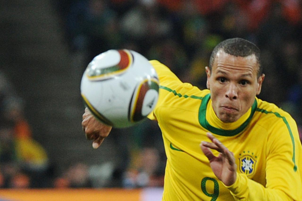 'Brazil\'s striker Luis Fabiano runs during Group G first round 2010 World Cup football match Brazil vs Ivory Coast on June 20, 2010 at Soccer City stadium in Soweto, suburban Johannesburg. NO PUSH TO