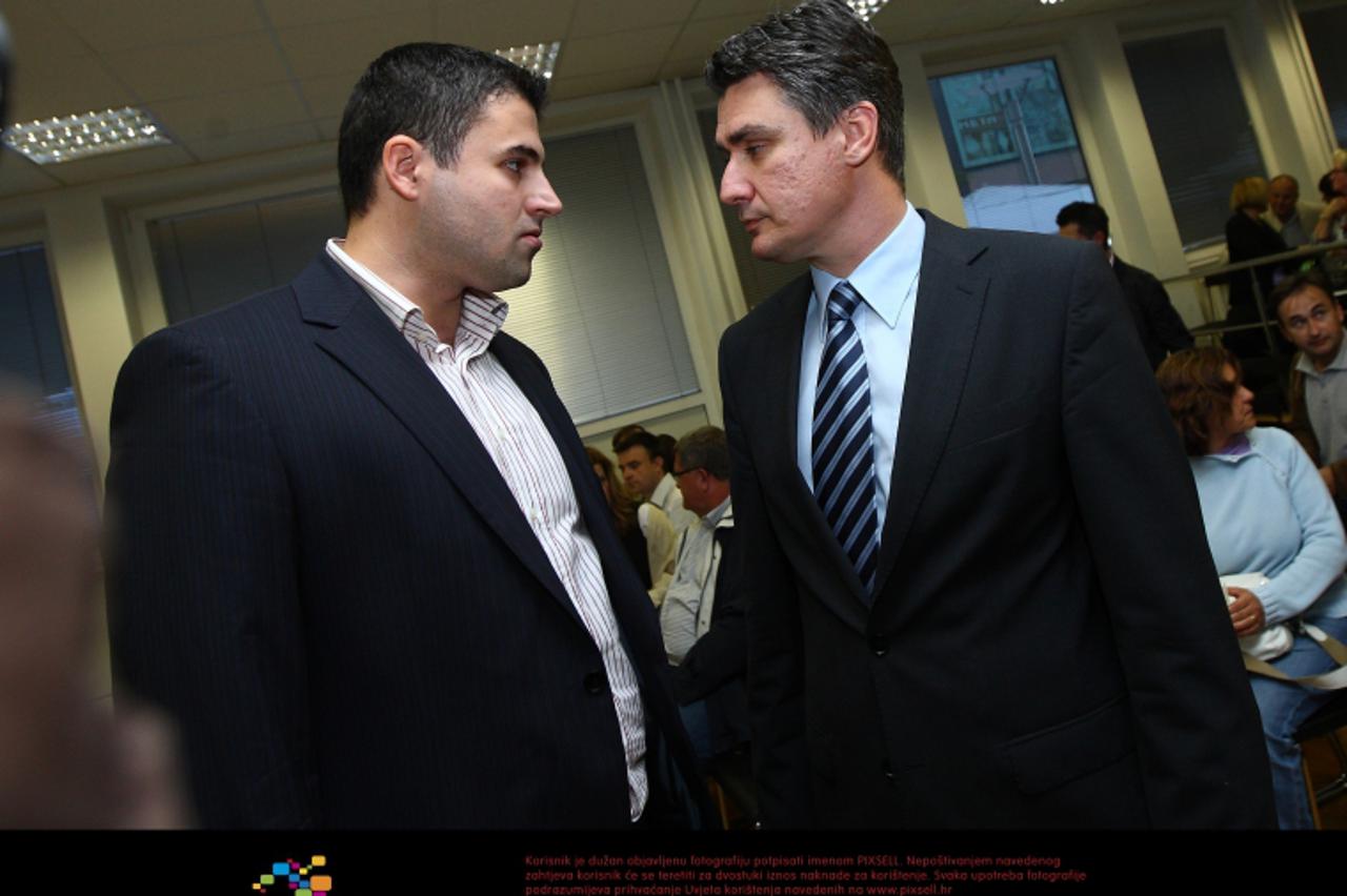 '24.09.2010., Zagreb - Clanovi SDP-a dolaze u sjediste SDP-a na Iblerovom trgu na  9. sjednicu Glavnog odbora SDP-a koja ce biti zatvorena za javnost. Predsjednik stranke - Zoran Milanovic, Davor Bern