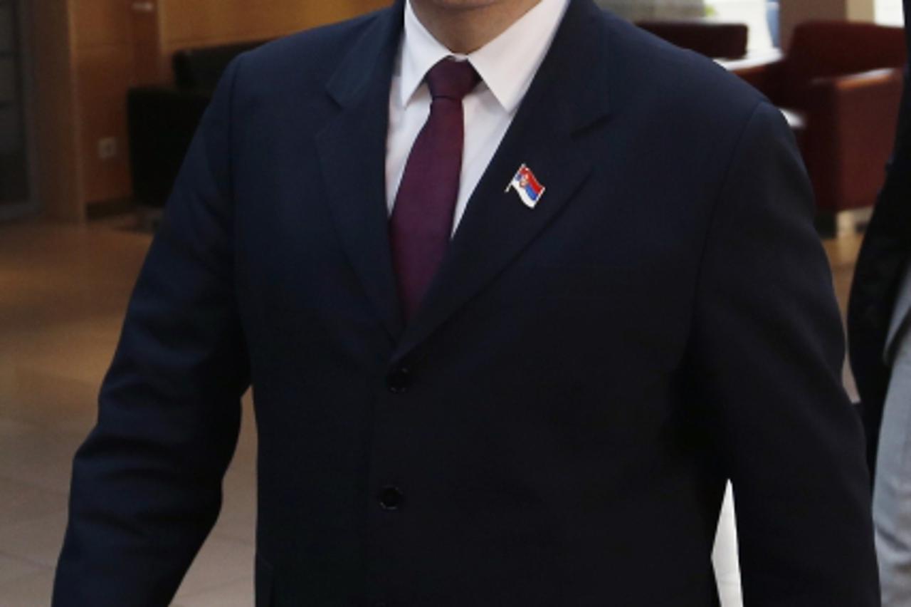 'Serbian Prime Minister Ivica Dacic arrives at NATO headquarters after meeting Kosovo\'s Prime Minister Hashim Thaci (not pictured) and European Union foreign policy chief Catherine Ashton (not pictur