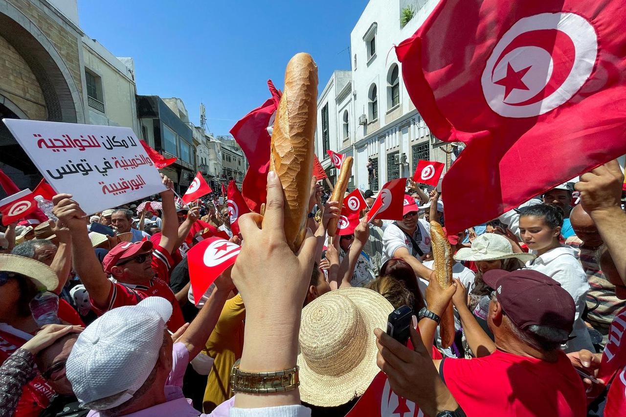 FILE PHOTO: Demonstrators protest against constitution referendum called by President Saied, in Tunis