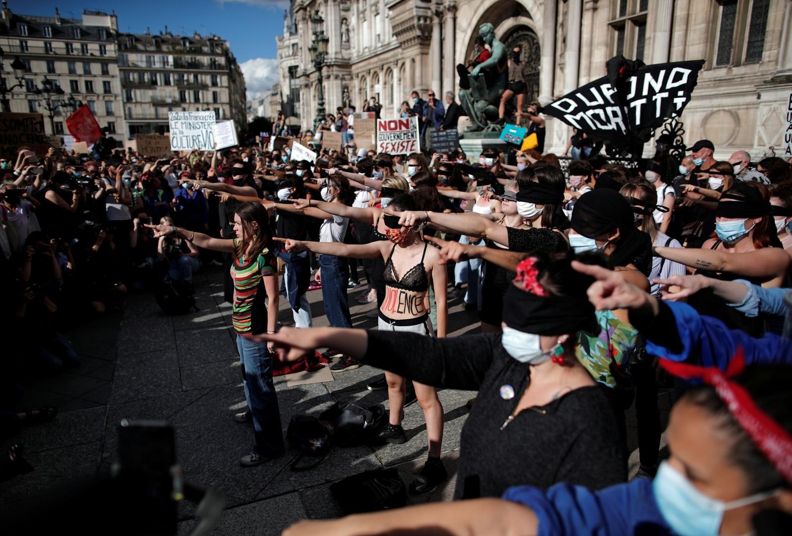 Feminist activists demonstrate against new government appointments in Paris Feminist activists demonstrate against the appointments of French Interior Minister Gerald Darmanin and Justice Minister Eric Dupond-Moretti in the new French government, in front of the city hall in Paris, France, July 10, 2020. REUTERS/Benoit Tessier BENOIT TESSIER