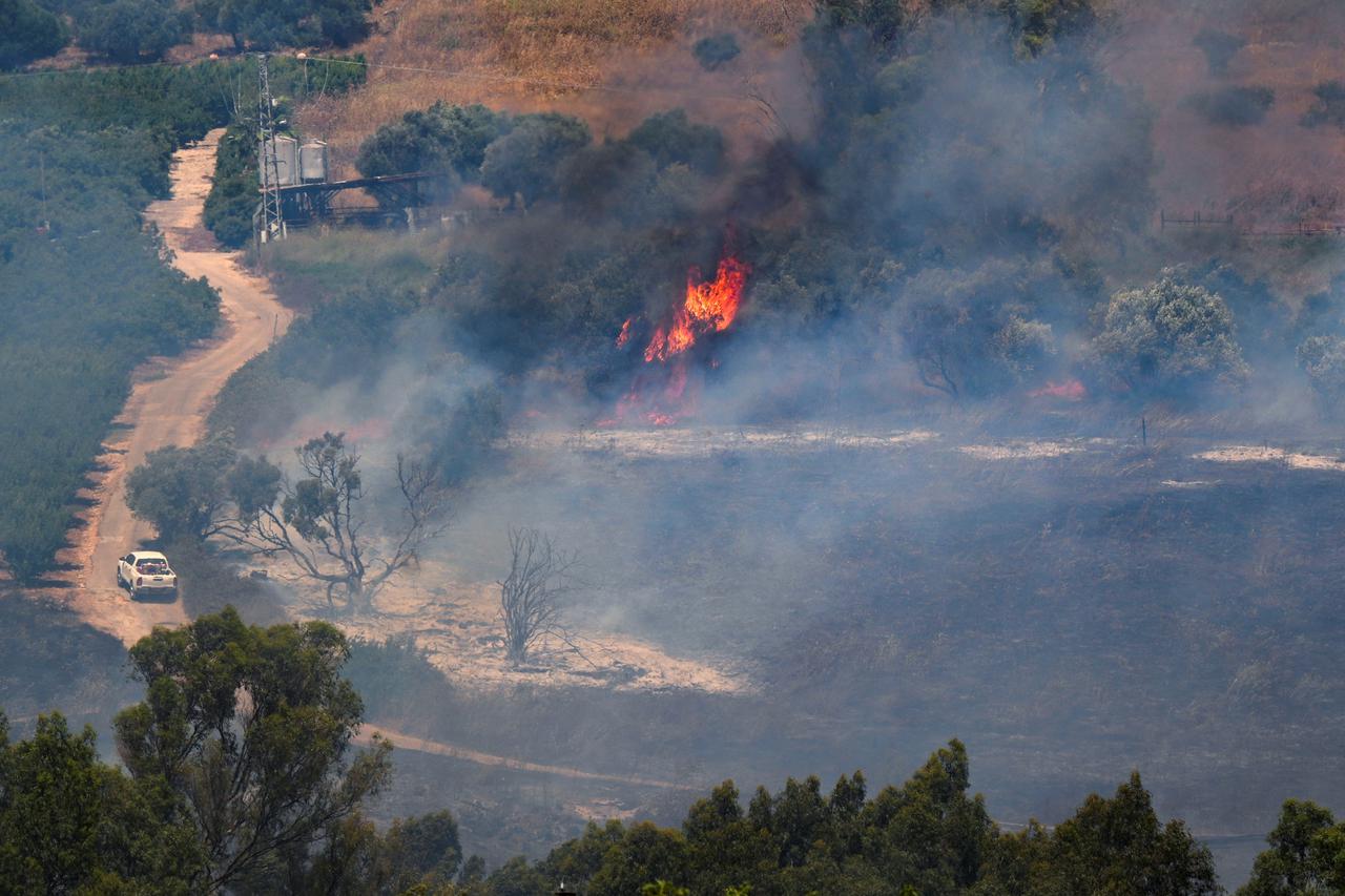 A fire blazes on the Israeli side of the Israel-Lebanon border following attacks from Lebanon, amid cross-border hostilities between Hezbollah and Israeli forces