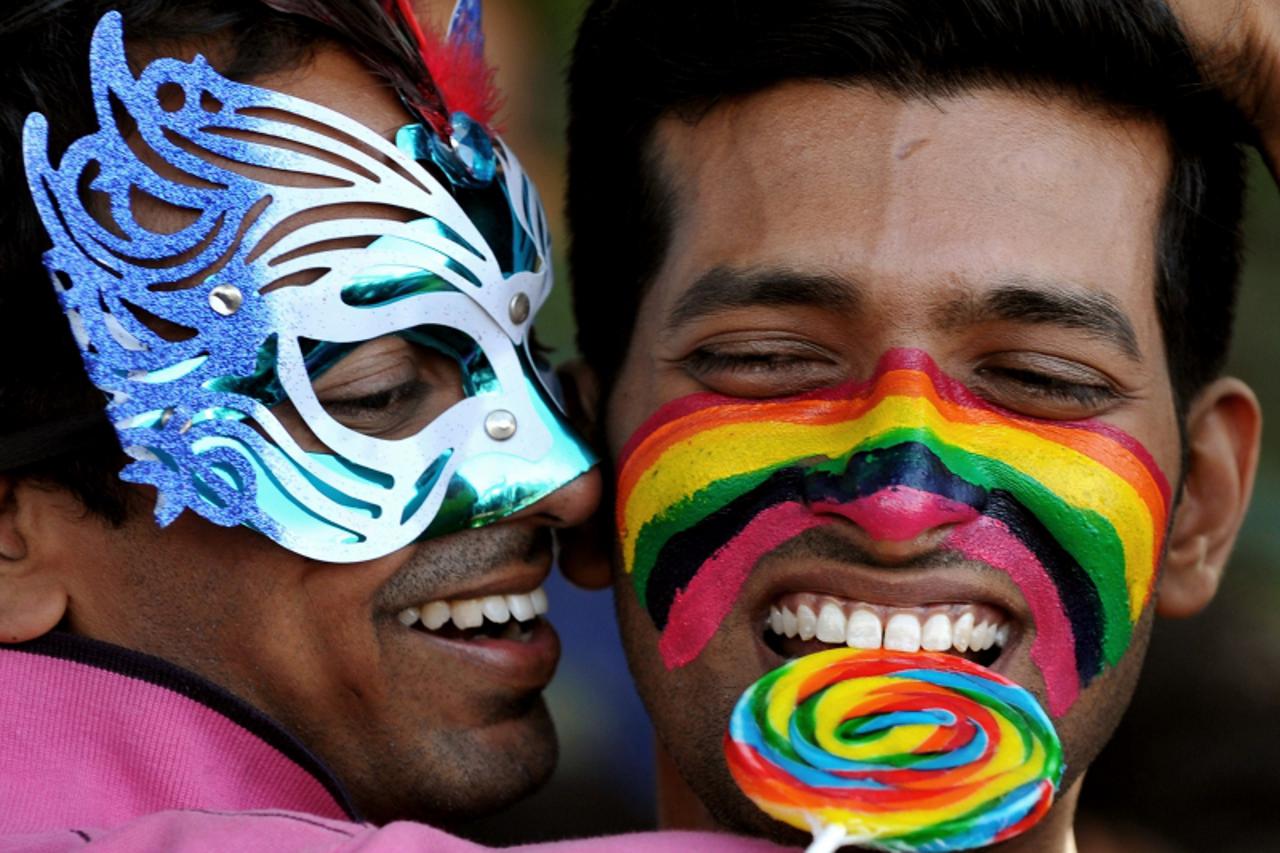 'Members of the LGBT (Lesbian, Gay, Bi-sexual and Transgender) community take part in the Bangalore Queer Pride Parade 2012 on December 2, 2012. The march marks the end of the annual 10-day Bengaluru 