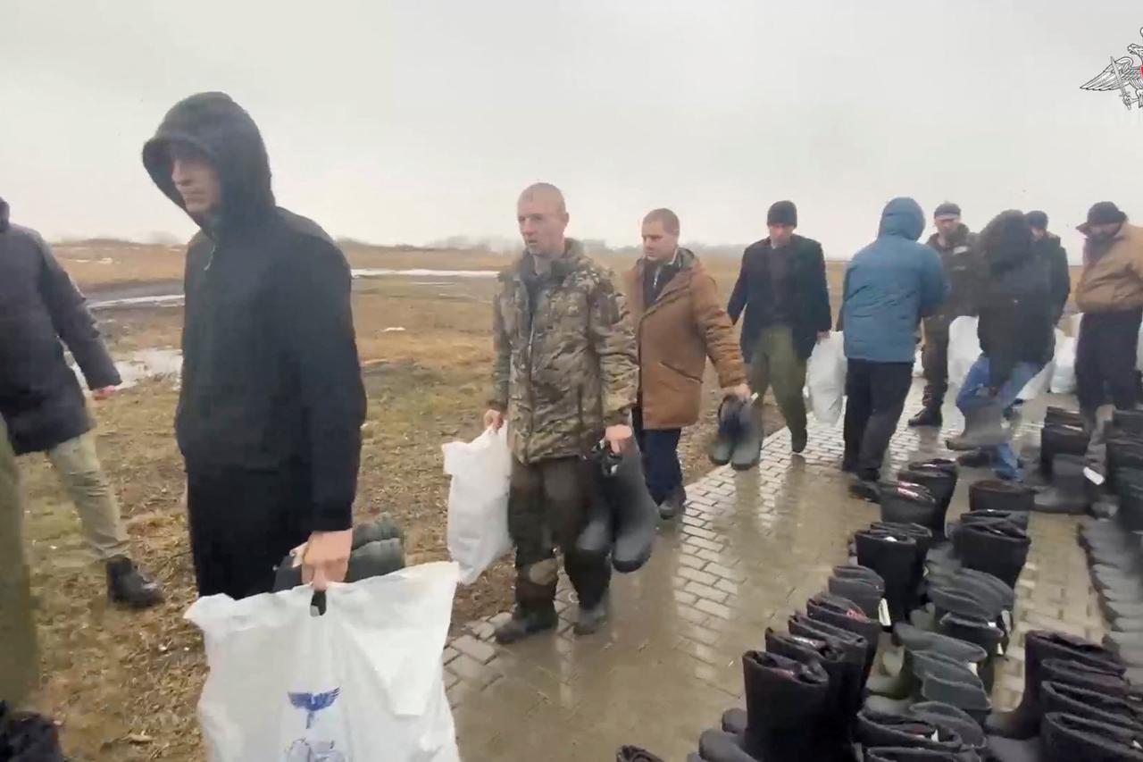 Russian soldiers return from Ukrainian captivity following a swap