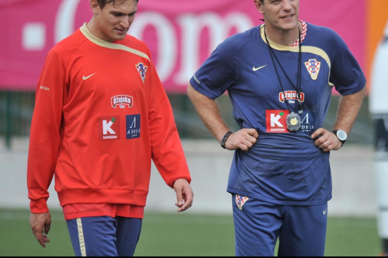 \'09.10.2009., Rovinj, Hrvatska - Trening hrvatske nogometne reprezentacije uoci kvalifikacijske utakmice protiv Kazahstana. Nikica Jelavic i Slaven Bilic.  Photo: Antonio Bronic/VLM/PIXSELL\'