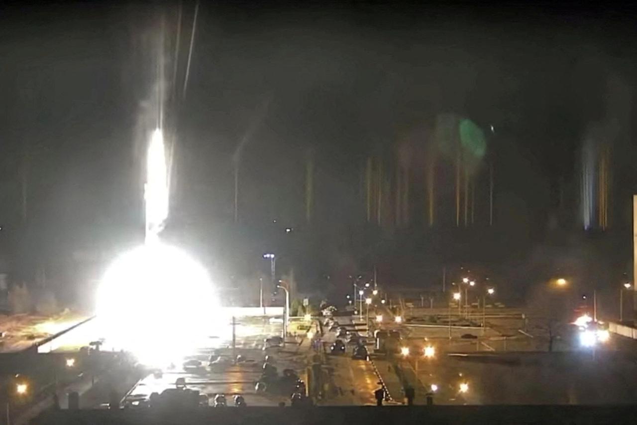 FILE PHOTO: Surveillance camera footage shows a flare landing at the Zaporizhzhia nuclear power plant during shelling in Enerhodar