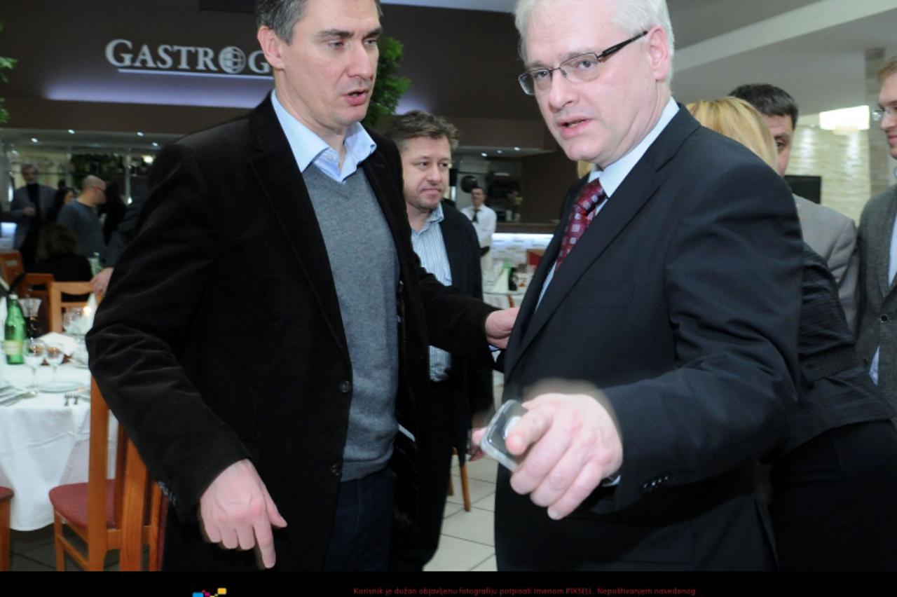 '05.02.2010. Hrvatska, Zagreb - U restoranu Gastro Globus odrzana je tradicionalana Mljetska noc. Zoran Milanovic i Ivo Josipovic. Photo: Anto Magzan/PIXSELL'