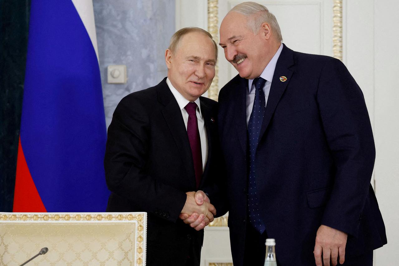 Russian President Putin and Belarusian President Lukashenko chair Union State's Council meeting in St Petersburg
