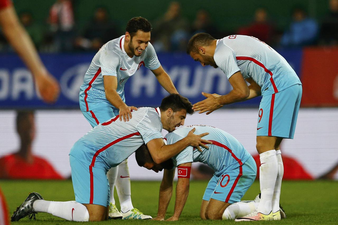 Football Soccer - Austria v Turkey - International friendly - Ernst Happel stadium, Vienna, Austria - 29/03/16. Turkey's Ozan Tufan, Hakan Calhanoglu, Arda Turan and Cenk Tosun react   REUTERS/Leonhard Foeger   Picture Supplied by Action Images